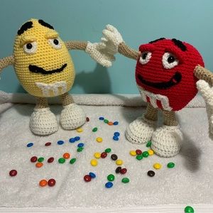 M&M men/ girl lol, they have bendable arms and legs.